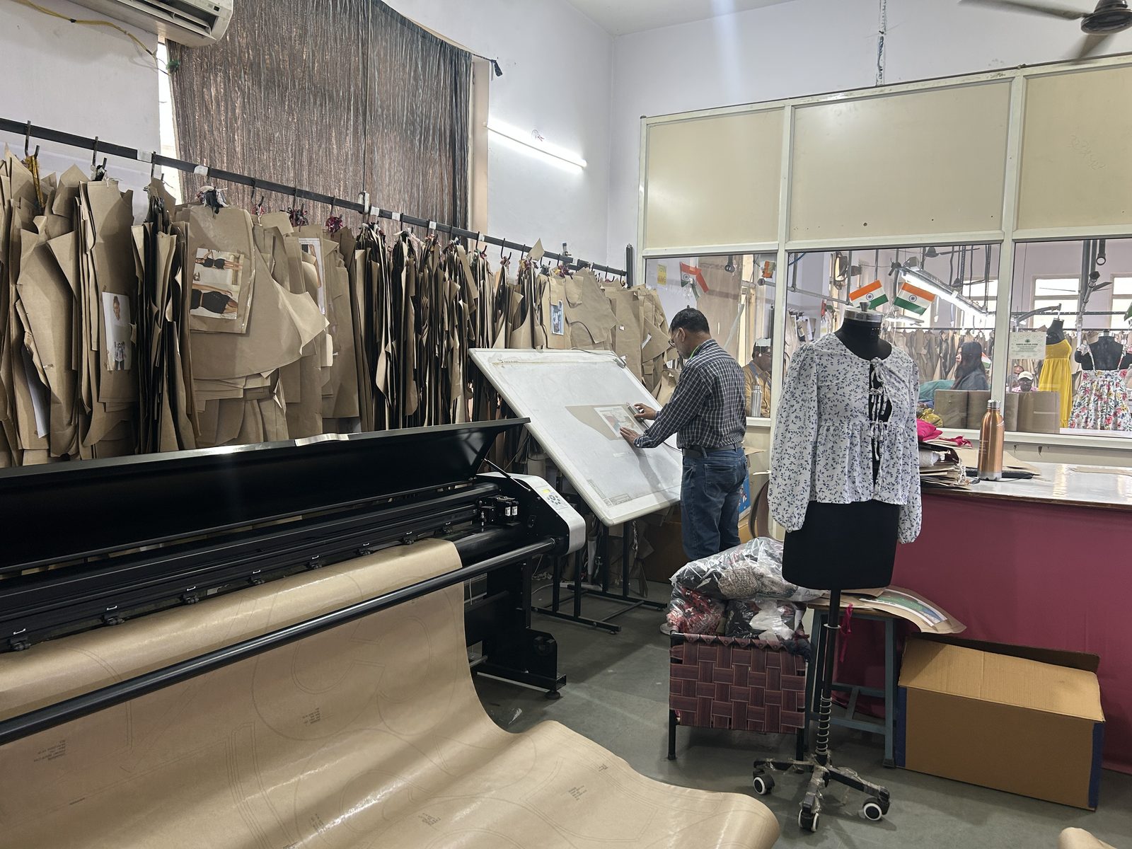 CAD pattern studio with digitizing board and plotter